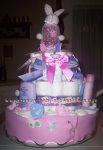 pink and blue bunny diaper cake