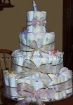 pink and gold diaper baby cake