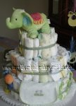 green and white elephant diaper cake with bib