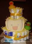 yellow duck baby shower diaper cake with paper shred