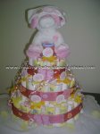 pink dog wit hat diaper cake