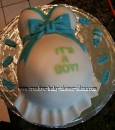 blue and green its a boy belly cake
