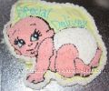 cute crawling baby cake that says special delivery
