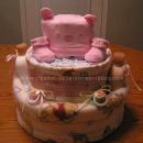 pink hat and booties winnie the pooh diaper cake