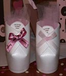 baby bootie cup favors with pink tulle and pink and brown accents