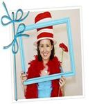 woman posing for picture with dr seuss hat turquoise fram and red flower