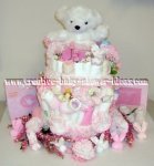 white and pink bear diaper cake