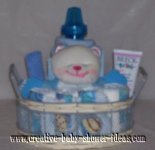 white and blue bear diaper cake