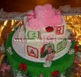 ladybug and booties baby blocks cake