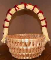 basket top tied with red ribbon