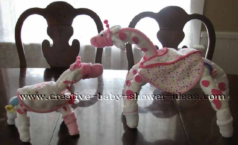 pink and white polka dots momma and baby giraffe diaper animals