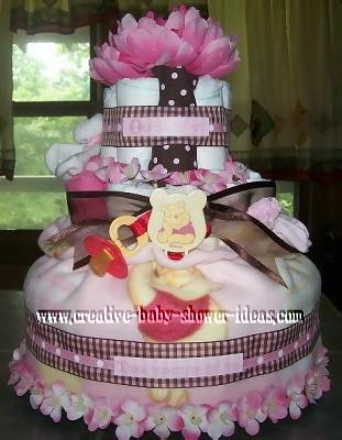 pink flower boutique winnie the pooh diaper cake