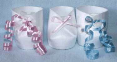 3 different kinds of baby bootie cup favors for baby shower