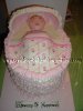 pink flowers ruffle baby bassinet cake