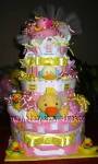 pink and yellow polka dot duck diaper cake