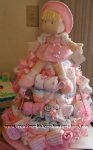 pink doll diaper cake