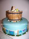 baby bathing in a barrel bathtub cake