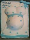 blue polka dot pregnant baby shower belly cake