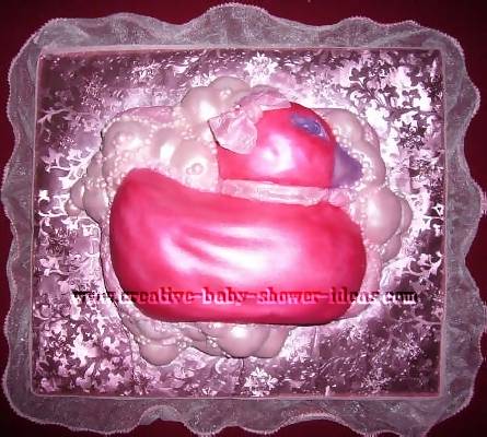 bright pink and purple duck cake with bubbles