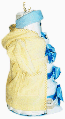 side view of baby cake with blue satin ribbon and yellow bathrobe