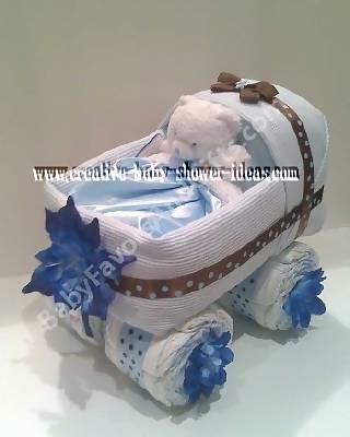 white and blue baby carriage diaper cake