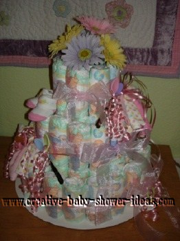 purple and pink flower diaper cake