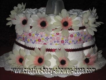 pink and purple daisies diaper cake