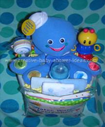bright blue baby octopus and toys diaper cake