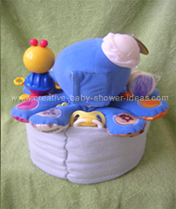 back of octopus diaper cake showing baby pins
