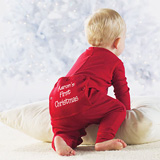 baby in red Christmas long johns