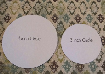 circle templates laying on scrapbooking paper