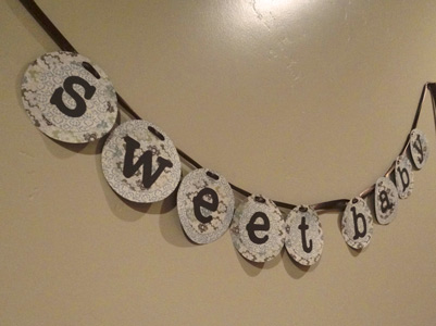 homemade green, brown and blue baby shower banner