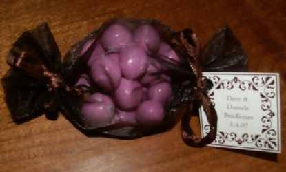 pink jordan almonds wrapped in tootsie roll favors