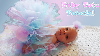 baby girl wearing pink and blue tutu