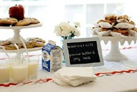 back to school baby shower table with chalkboards lunchtrays apples and milk cartons