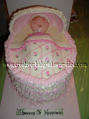 baby sleeping in a bassinet cake