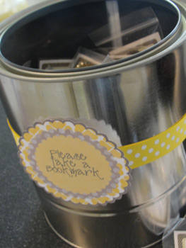 paint bucket holding book baby shower favors