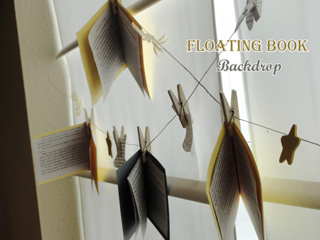suspended books and stars backdrop
