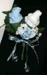 white and blue sock rose boutonniere