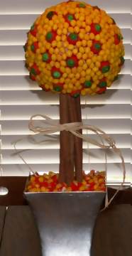 candy corn topiary bouquet with mellow creme pumpkins