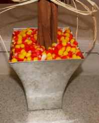 candy corn filling the remaining space for topiary base