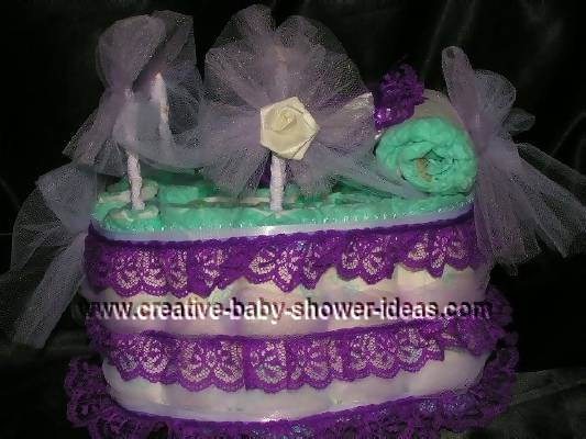 purple lace baby carriage diaper cake