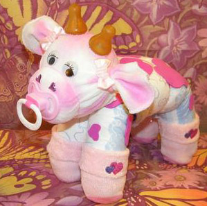 pink and white diaper cow