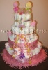 princess diaper cake with diaper towers and washcloth lollipop spires