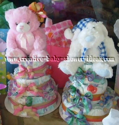blue and pink twin diaper cakes