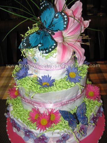 bright blue butterfly diaper cake centerpiece