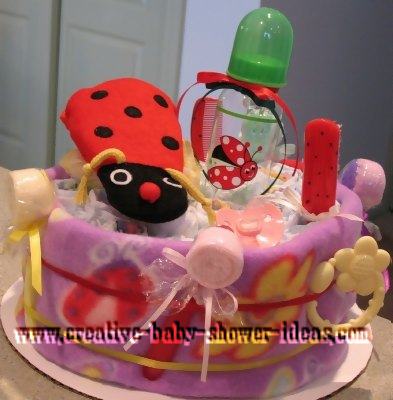 red ladybug diaper cake centerpiece