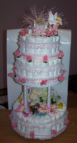 pink lace and rosebuds diaper cake