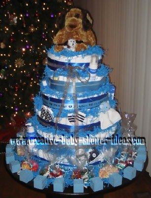 blue dog diaper cake with baby block favors