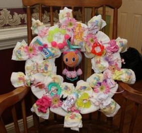 blue and pink glow worm diaper wreath instructions